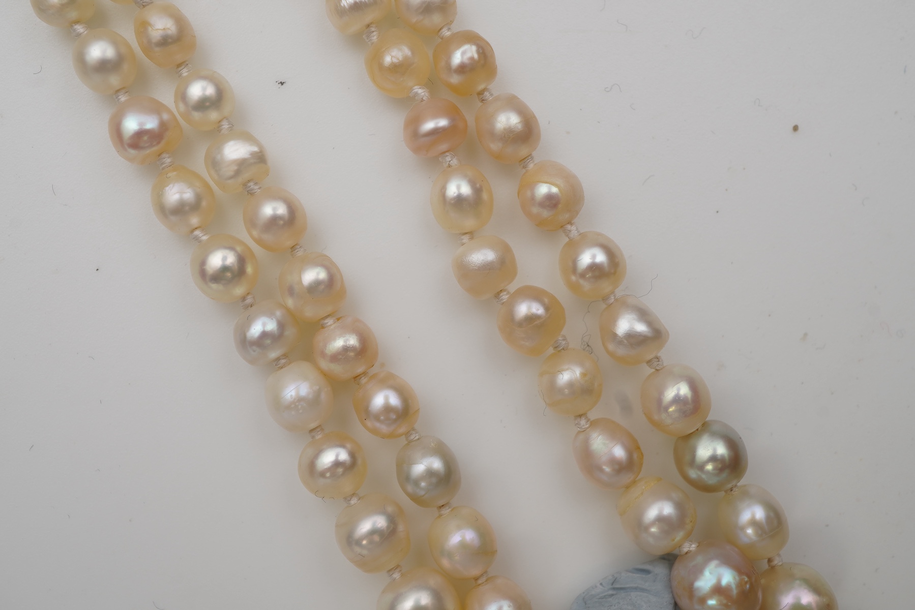 A natural pearl and diamond necklace, early 20th century